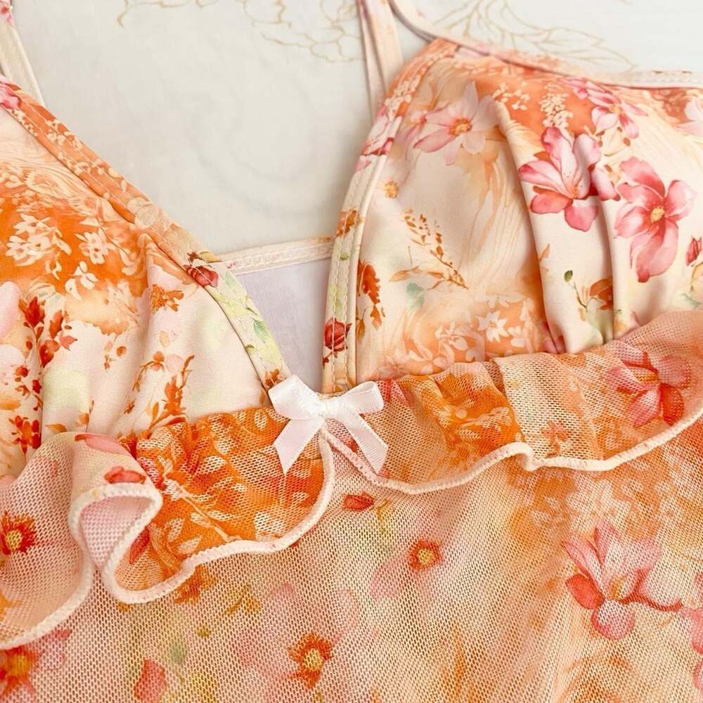 orange bikini top with floral print, ruffles, and bow - Picture 2 of 4